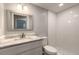 Modern bathroom with white subway tile and quartz vanity at 1631 Granada Ave, Daytona Beach, FL 32117