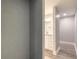 Modern bathroom with white vanity and gray floor at 1631 Granada Ave, Daytona Beach, FL 32117