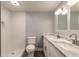 Updated bathroom with double vanity and shower at 1631 Granada Ave, Daytona Beach, FL 32117