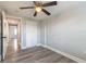 Bedroom with new flooring, ceiling fan and built-in closet at 1631 Granada Ave, Daytona Beach, FL 32117