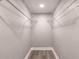 Walk-in closet with wire shelving and gray walls at 1631 Granada Ave, Daytona Beach, FL 32117