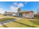 Newly renovated home with a charming front porch and walkway at 1631 Granada Ave, Daytona Beach, FL 32117