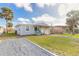 Newly renovated home with a charming front porch and walkway at 1631 Granada Ave, Daytona Beach, FL 32117