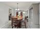 Dining room with a wooden table, chairs, and a built-in hutch at 1639 Templewood Ave, Deltona, FL 32725