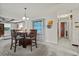 Dining area with wooden table and chairs, and china cabinet at 1639 Templewood Ave, Deltona, FL 32725