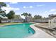 Relaxing kidney-shaped pool with shed at 1661 Bismarck Dr, Deltona, FL 32725