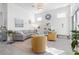 Living room with comfortable seating, a large rug, and natural light at 168 Azure Ct, Daytona Beach, FL 32124