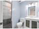 Updated bathroom with a shower and white vanity at 2 Fair Oaks Cir, Ormond Beach, FL 32174