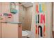 Small bathroom with shower and colorful shower curtain at 2236 River Ridge Rd, Deland, FL 32720