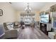 Relaxing living room with fireplace and bay window at 2236 River Ridge Rd, Deland, FL 32720