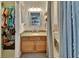 Bathroom with granite vanity, and a separate toilet area at 2585 Delbarton Ave, Deltona, FL 32725