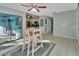 Bright breakfast nook with sliding doors leading to a screened patio at 2585 Delbarton Ave, Deltona, FL 32725