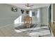 Kitchen breakfast nook with wood table and chairs, and view to backyard at 2585 Delbarton Ave, Deltona, FL 32725