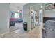 View of living room and kitchen with stainless steel appliances at 2585 Delbarton Ave, Deltona, FL 32725