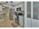 Stainless steel appliances, granite countertops, and white cabinets at 2585 Delbarton Ave, Deltona, FL 32725
