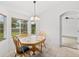 Bright dining area with wood table and chairs near kitchen at 274 Sunrise Blvd, Debary, FL 32713