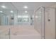 Bathroom boasts a large bathtub and walk-in shower at 2967 S Atlantic Ave # 204, Daytona Beach Shores, FL 32118