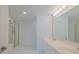 Bathroom with double vanity, shower, and bathtub at 2967 S Atlantic Ave # 204, Daytona Beach Shores, FL 32118