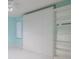 Bedroom with spacious built-in wardrobe and shelving at 2967 S Atlantic Ave # 204, Daytona Beach Shores, FL 32118