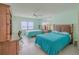 Bedroom with two beds and built-in desk, perfect for guests or a home office at 2967 S Atlantic Ave # 204, Daytona Beach Shores, FL 32118