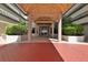 Building entrance with covered walkway and landscaping at 2967 S Atlantic Ave # 204, Daytona Beach Shores, FL 32118