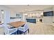 Shared kitchen with modern appliances and a breakfast bar at 2967 S Atlantic Ave # 204, Daytona Beach Shores, FL 32118