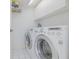 Laundry room with washer and dryer, providing in-unit laundry convenience at 2967 S Atlantic Ave # 204, Daytona Beach Shores, FL 32118