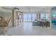 Spacious living room with ocean view, sectional sofa, and built-ins at 2967 S Atlantic Ave # 204, Daytona Beach Shores, FL 32118