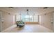 Building lobby with seating area and large window at 2967 S Atlantic Ave # 204, Daytona Beach Shores, FL 32118