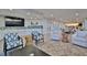 Community room with comfortable seating and a large TV at 2967 S Atlantic Ave # 204, Daytona Beach Shores, FL 32118