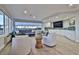 Relaxing lounge area with comfortable seating and large windows at 2967 S Atlantic Ave # 204, Daytona Beach Shores, FL 32118