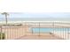 Balcony view of a condo's pool and the ocean at 2967 S Atlantic Ave # 204, Daytona Beach Shores, FL 32118
