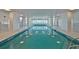 Indoor heated lap pool with large windows at 2967 S Atlantic Ave # 204, Daytona Beach Shores, FL 32118
