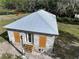 Unfinished house with metal roof, viewed from above at 353 Vannote Rd, Pierson, FL 32180