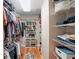 Large walk-in closet with ample shelving and hanging space at 624 E Old Mill Dr, Debary, FL 32713