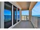 Private balcony with sliding glass doors and ocean view at 89 S Atlantic Ave # 901, Ormond Beach, FL 32176