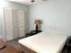 Cozy bedroom with double bed and built-in closet at 101 N Hill S Ave # 7, Deland, FL 32724