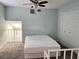 Upstairs loft bedroom with double bed and closet at 101 N Hill S Ave # 7, Deland, FL 32724