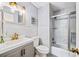 Updated bathroom with gray vanity and marble shower at 1601 Ocean Shore Blvd # 1040, Ormond Beach, FL 32176