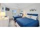 Guest bedroom with two twin beds and ocean view at 1601 Ocean Shore Blvd # 1040, Ormond Beach, FL 32176