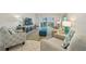 Bright living room with comfy seating and ocean views at 1601 Ocean Shore Blvd # 1040, Ormond Beach, FL 32176