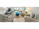 Comfortable living room with ocean view and patio access at 1601 Ocean Shore Blvd # 1040, Ormond Beach, FL 32176