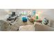 Comfortable living room with ocean view and patio access at 1601 Ocean Shore Blvd # 1040, Ormond Beach, FL 32176