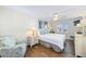 Relaxing primary bedroom with wood floors and ocean view at 1601 Ocean Shore Blvd # 1040, Ormond Beach, FL 32176