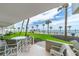 Ground floor patio with ocean view and lush landscaping at 1601 Ocean Shore Blvd # 1040, Ormond Beach, FL 32176
