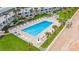 Rectangular pool with lounge chairs and beach access at 1601 Ocean Shore Blvd # 1040, Ormond Beach, FL 32176