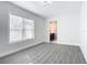 Bedroom with grey flooring and an ensuite bathroom at 1604 Carmen Ave, Daytona Beach, FL 32117