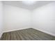 Empty bedroom with vinyl flooring, ready for your furniture at 1604 Carmen Ave, Daytona Beach, FL 32117