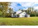 Two-story house with gray siding, columns, and attached garage at 1907 Enterprise Osteen Rd, Deltona, FL 32738