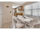 Bright dining area with table and chairs near kitchen at 1931 Viking Ave, Deltona, FL 32725